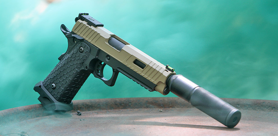 valken by hicapa airsoft pistol with tan slide and black frame with threaded barrel and suppressor kit installed